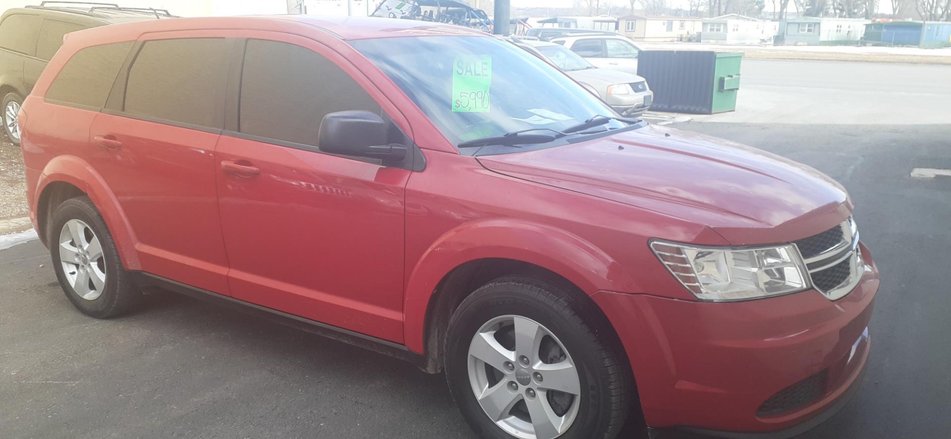 2013 Dodge Journey SE (3C4PDCAB4DT) with an 2.4L L4 DOHC 16V engine, 4-Speed Automatic transmission, located at 2015 Cambell Street, Rapid City, SD, 57701, (605) 342-8326, 44.066433, -103.191772 - Photo#6